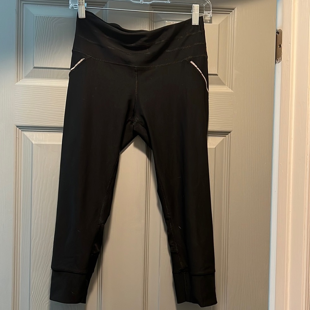 RBX women’s small, athletic capris, black with reflective detail and pocket